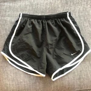 Black Nike running shorts